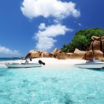 17874863 – speed boat on the beach of coco island, seychelles